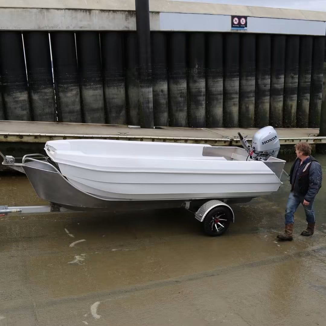 Seahull hull on an aluminium floating trailer at the boat ramp