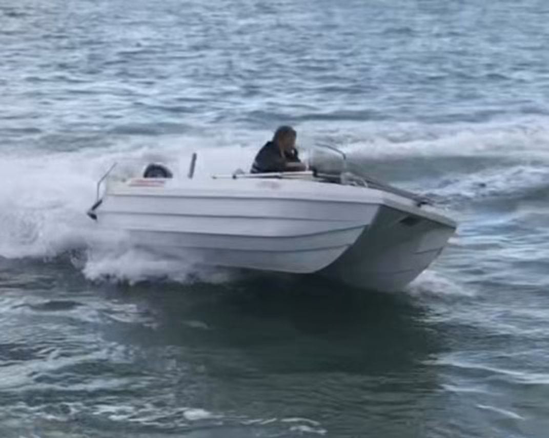 Seahull catamaran cornering at speed